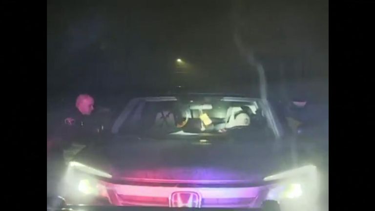 Police in Wisconsin struggle to wake a drunk driver asleep at the wheel