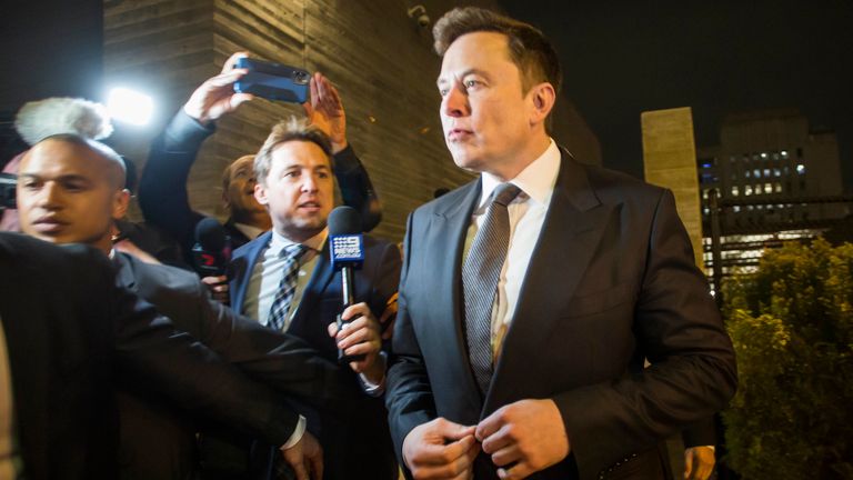 Elon Musk, chief executive officer of Tesla Inc. leaves  the US District Court, Central District of California through a back door in Los Angeles, U.S. on December 3, 2019