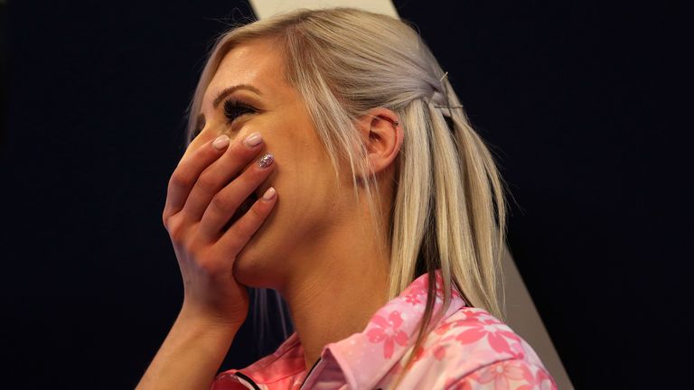 Fallon Sherrock covered her mouth in shock as she won her second round match at the World Championships