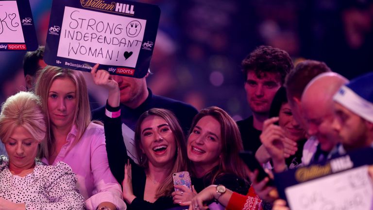 Fans supported the 25-year-old darts player as she went into the third round