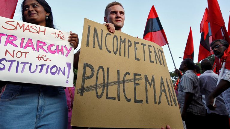 Jakob Lindenthal (C), a German student, attends a march to show solidarity