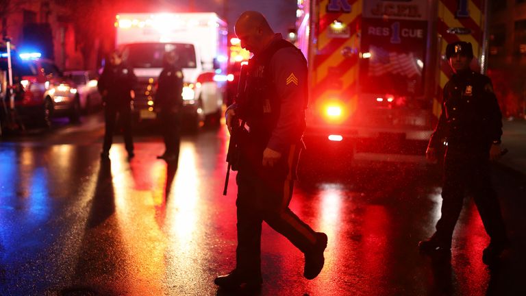 Officers at the scene after a shooting in Jersey City, New Jersey, this December