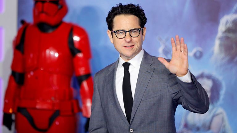 Film director JJ Abrams poses on the red carpet upon arrival for the European film premiere of Star Wars: The Rise of Skywalker 