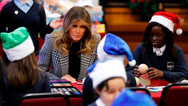 Melania Trump joins school children at the Salvation Army centre during her visit to London