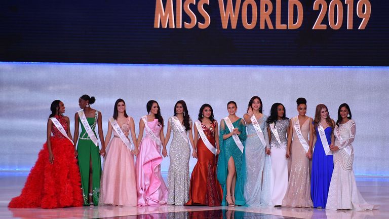 The twelve finalists line up during the Miss World Final 2019 