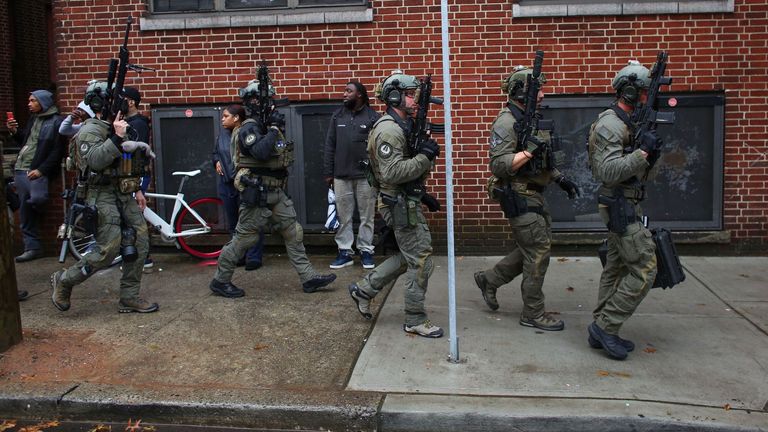Officers arrive at the scene of the shooting in New Jersey