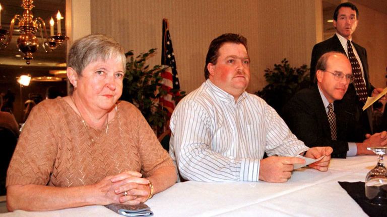Richard Jewell (C) his mother Barbara (L) and attorneys Watson Bryant (R) and Wayne Grant (far R) look on during a press conference 28 October in Atlanta, Ga. Jewell was cleared as a suspect in the July 27 bombing of Centennial Olympic Park