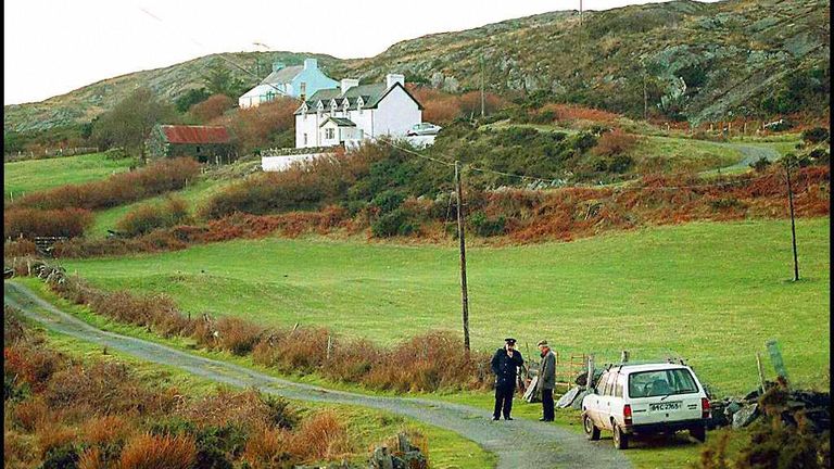 Police wait near the Irish home of Sophie Toscan du Plantier in 1996
