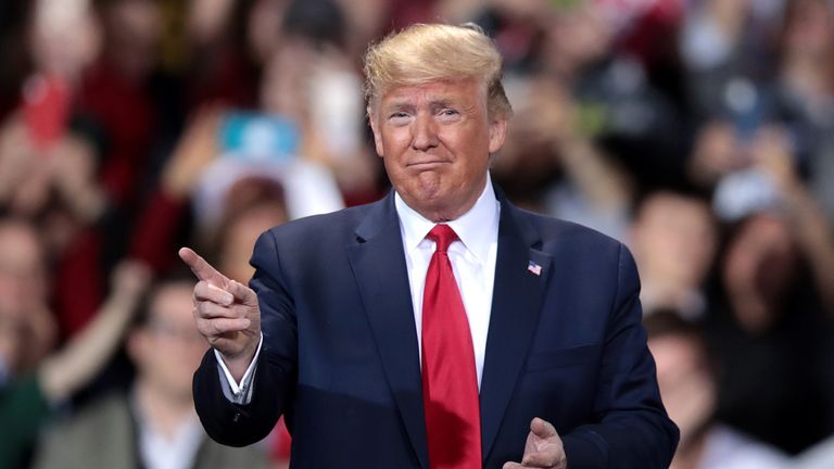 BATTLE CREEK, MICHIGAN - DECEMBER 18: President Donald Trump hosts a Merry Christmas Rally at the Kellogg Arena on December 18, 2019 in Battle Creek, Michigan. While Trump spoke, the House of Representatives was voting on two articles of impeachment, deciding if he will become the third president in U.S. history to be impeached. (Photo by Scott Olson/Getty Images)