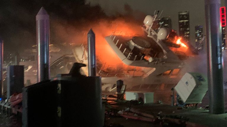 Images show the boat gradually leaning to one side. Pic. Twitter/@CityofMiamiFire