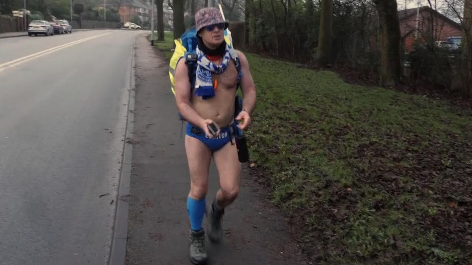 'Speedo Mick' finishes epic 1,000mile trek in his trunks with