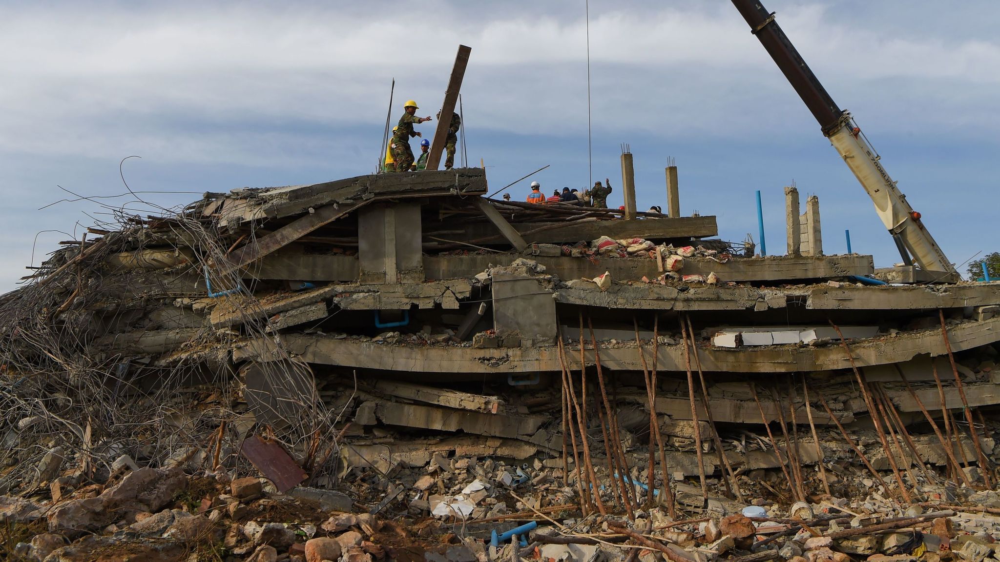 Six children among 36 dead in Cambodia building collapse | World News ...