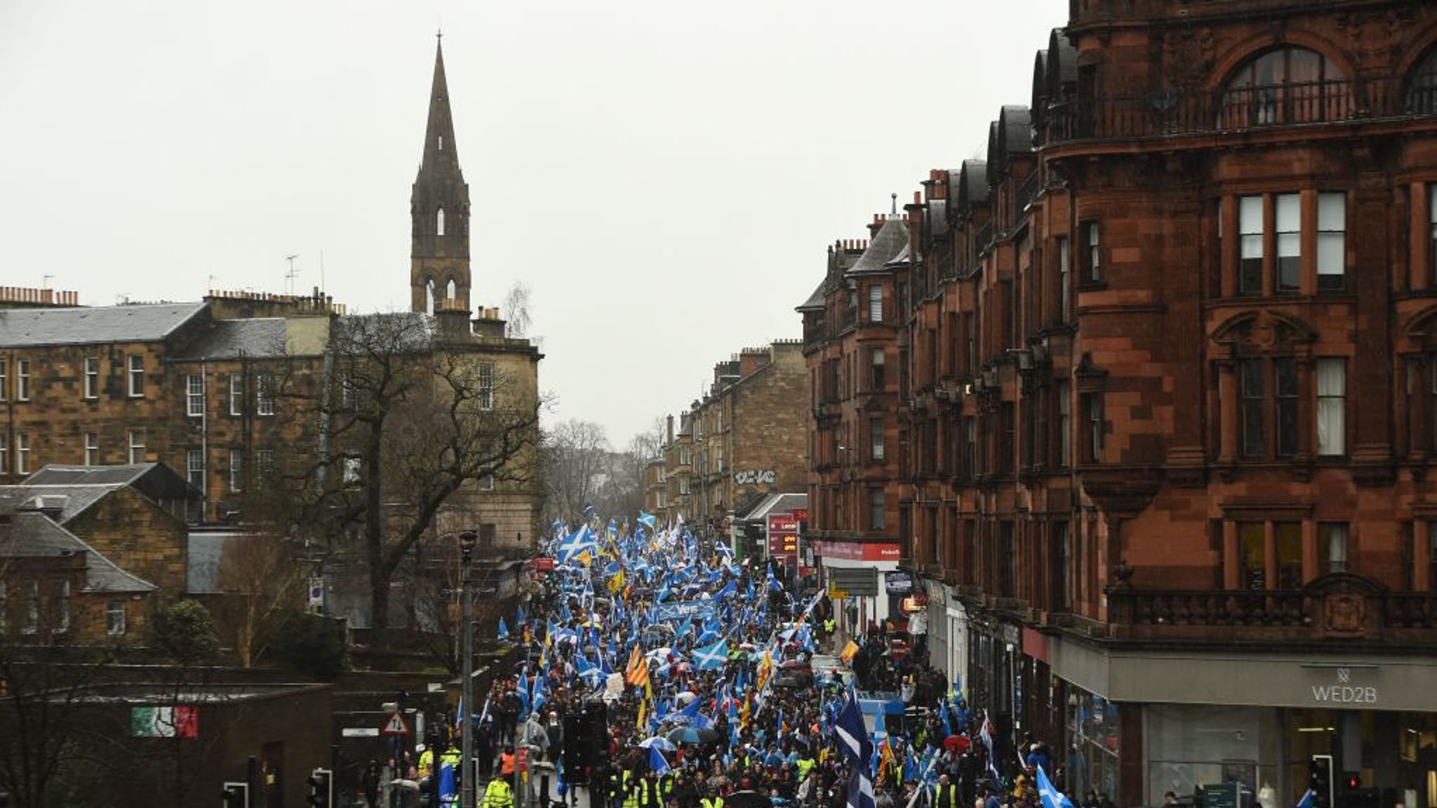 Scottish Independence Supporters March Through Rainy Glasgow Streets ...