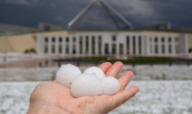 Australians face dust clouds, hail storms and flooding amid continuing bushfires