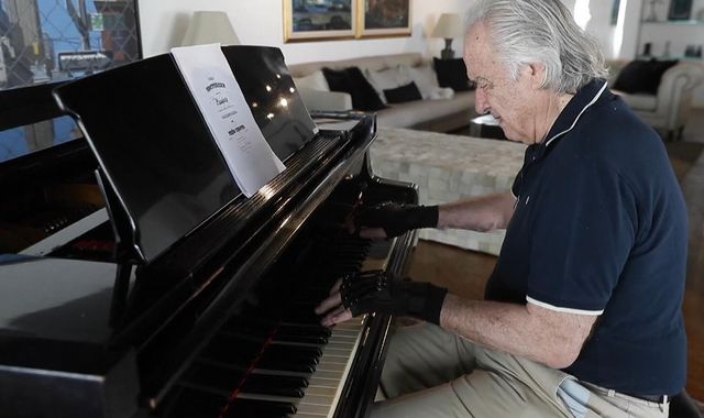 Bionic gloves allow injured concert pianist Joo Carlos Martins to play again