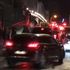 Macron rushed out of theatre after protesters try to confront him