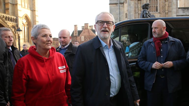 Britain's opposition Labour party leader Jeremy Corbyn (C) arrives with Labour Party General Secretary Jennie Formby (L), to address a general election campaign rally on College Green in Bristol, southwest England, on December 9, 2019. - Britain will go to the polls on December 12, 2019 to vote in a pre-Christmas general election. (Photo by Isabel Infantes / AFP) (Photo by ISABEL INFANTES/AFP via Getty Images)