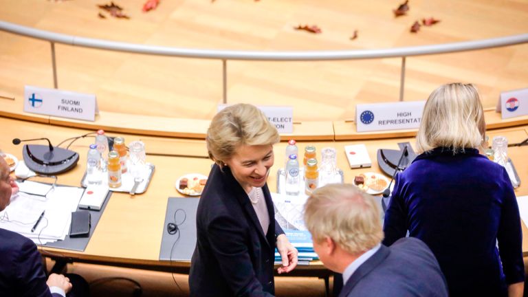 British Prime Minister Boris Johnson (front R) greets Incoming European Commission President Ursula von der Leyen during a round table meeting as part of a European Union summit at European Union Headquarters in Brussels on October 17, 2019. - Britain and the European Union reached a new divorce deal on October 17, 2019 that could allow Brexit on October 31, but faced immediate opposition among MPs in London -- who can still block it. (Photo by Olivier Matthys / POOL / AFP) (Photo by OLIVIER MATTHYS/POOL/AFP via Getty Images)