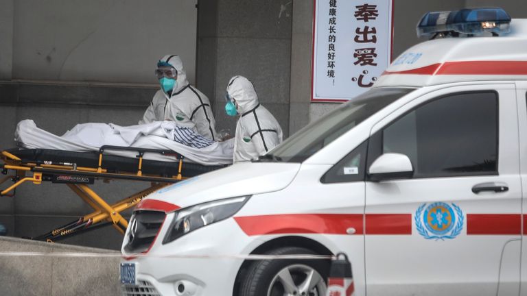 WUHAN, CHINA - JANUARY 17: (CHINA OUT) Medical staff transfer patients to Jin Yintan hospital on January 17, 2020 in Wuhan, Hubei, China. Local authorities have confirmed that a second person in the city has died of a pneumonia-like virus since the outbreak started in December. (Photo by Getty Images)