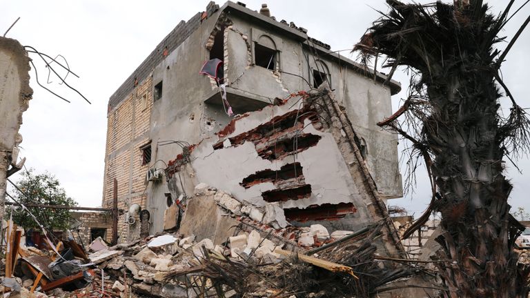 A damaged building is seen after an air strike at Tajura neighbourhood, east of Tripoli, Libya December 30, 2019.  REUTERS/Ismail Zitouny