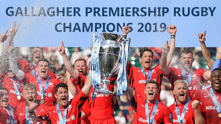 LONDON, ENGLAND - JUNE 01: Brad Barritt and Owen Farrell of Saracens lift the trophy after winning the the Gallagher Premiership Rugby Final between Exeter Chiefs and Saracens at Twickenham Stadium on June 01, 2019 in London, United Kingdom. (Photo by Dan Mullan/Getty Images)