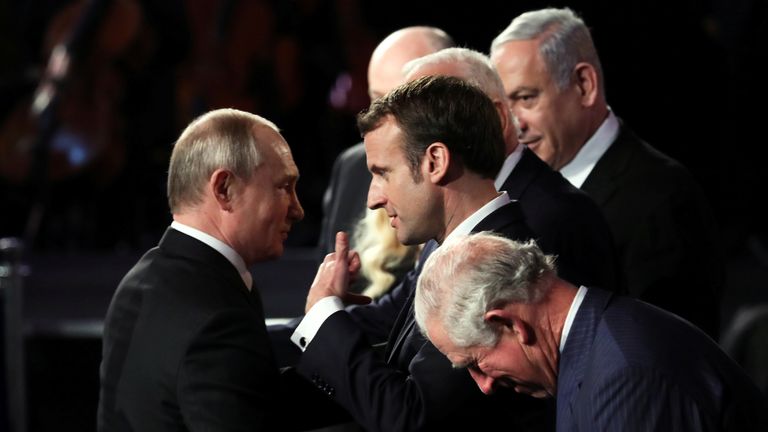 Russian President Vladimir Putin talks with French President Emmanuel Macron next to Britain's Prince Charles during the Fifth World Holocaust Forum at the Yad Vashem Holocaust memorial museum in Jerusalem, January 23, 2020. Abir Sultan/Pool via REUTERS