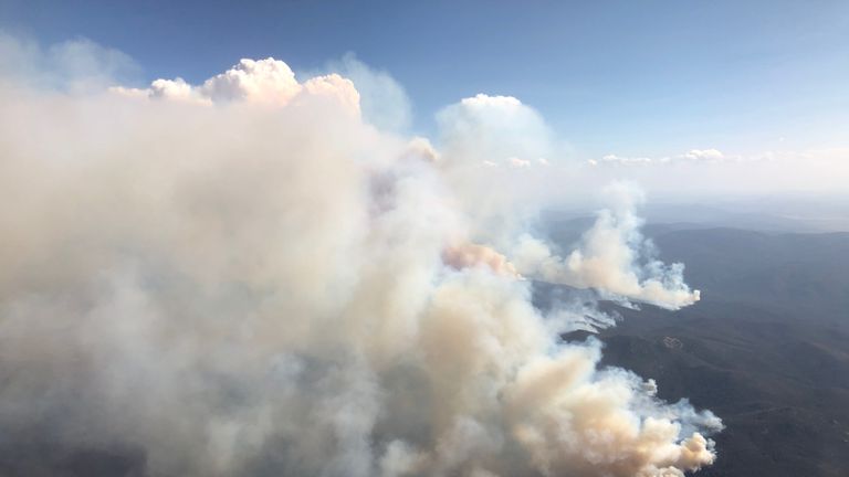 An aerial view of bushfires burning south of Canberra on January 31, 2020 in Canberra, Australia. ACT Chief Minister Andrew Barr declared a State of Emergency on Friday, as the Orroral Valley bushfire continues to burn out of control. Hot and windy weather conditions forecast for the weekend are expected to increase the bushfire threat to homes in the Canberra region. It is the worst bushfire threat for the area since 2003, when four people died and 470 homes were destroyed or damaged.