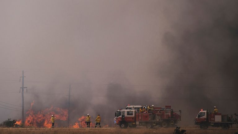 Fire crews working to contain a fire near Canberra