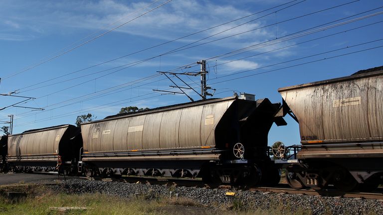 A coal train is seen moving parallel to the A4 Highway in the Clermont and Blackwater region on April 29, 2019 in Clermont, Australia. 