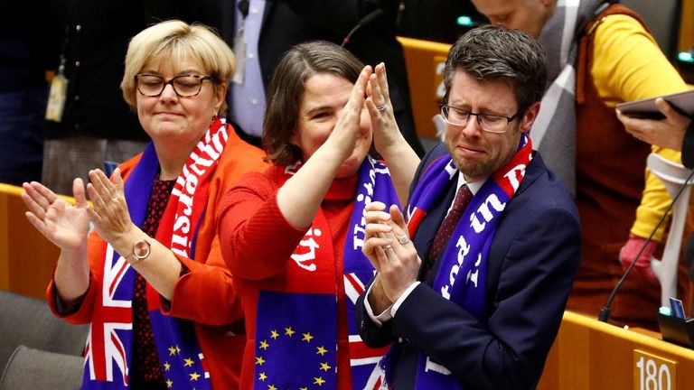 Pro-Remain MEPs burst into a rendition of Auld Lang Syne after the withdrawal agreement was approved