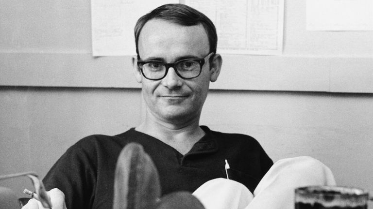 Buck Henry is pictured at his desk in 1966