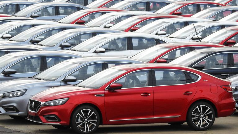 Chinese-made cars are readied for export as auto sales in the country fall sharply