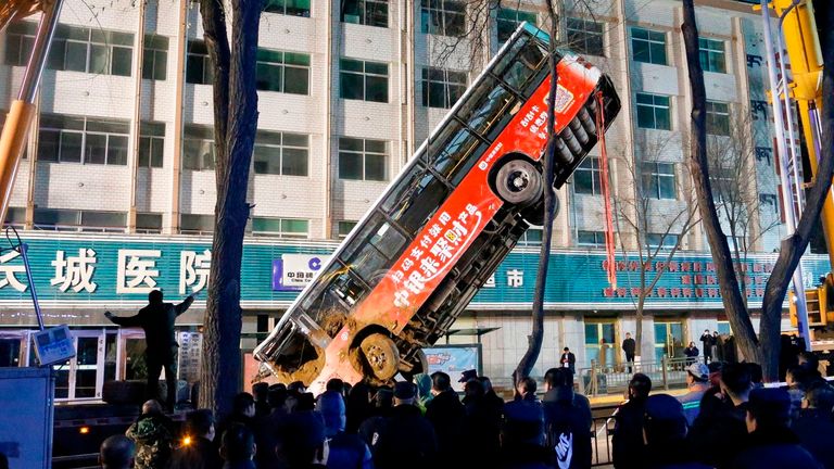 At least six dead as huge sinkhole swallows bus and pedestrians in China (PHOTOS)