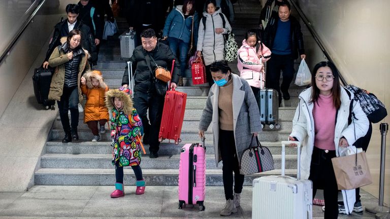 Passengers arrive in Beijing ahead of lunar new year celebrations 