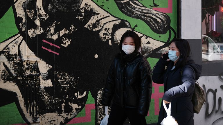 NEW YORK, NEW YORK - JANUARY 29: People wear medical face masks on the streets of Chinatown on January 29, 2020 in New York City. Sales of medical face masks have seen a sharp increase as fears of coronavirus grow and many retailers have sold out. The coronavirus, which originated in Wuhan, China, has now infected more than 6,150 people in more than a dozen countries. (Photo by Spencer Platt/Getty Images)
