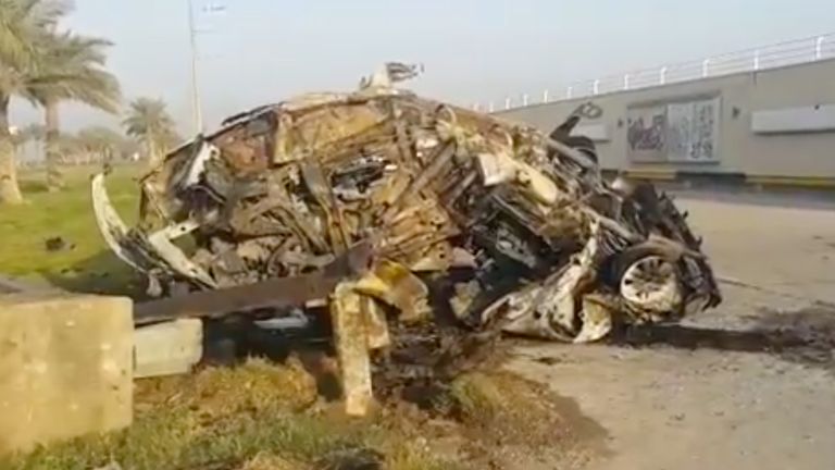 A damaged car, claimed to belong to Qassem Soleimani and Abu Mahdi al Muhandis, is seen near Baghdad airport