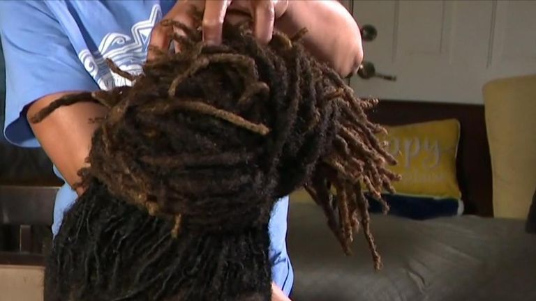 A black teenager has said he has been suspended from Barbers Hill High School in Mont Belvieu and told he can&#39;t attend his graduation ceremony unless he cuts his dreadlocks.