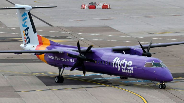 This picture shows a Dash 8 Q400 of Flybe airline on September 24, 2019 at the airport in Duesseldorf, western Germany.
