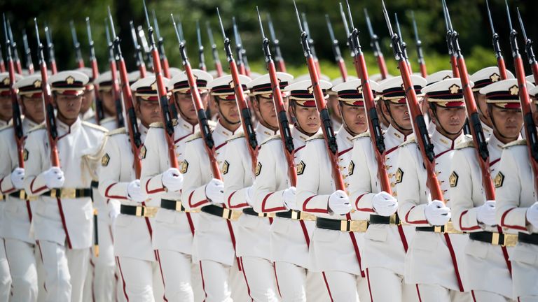 TOKYO, JAPAN - SEPTEMBER 17: A Japanese Self Defense Forces (SDF) honor guard marches before the inspection by Japan's Prime Minister Shinzo Abe at the Ministry of Defense on September 17, 2019 in Tokyo, Japan. Abe pledged Sunday, after reshuffling his cabinet, to push for a revision of the SDF stipulation in Article 9 of the Constitution. (Photo by Tomohiro Ohsumi/Getty Images)
