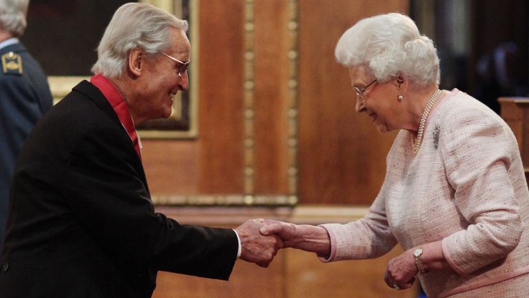 Nicholas Parsons is made a CBE (Commander of the Order of the British Empire) by Queen Elizabeth II at Windsor Castle