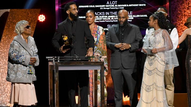 Nipsey Hussle&#39;s grandmother Margaret Bouffe, Samiel Asghedom, Nipsey Hussle&#39;s sister Samantha Smith and Nipsey Hussle&#39;s daughter Emani Asghedom accept Best Rap Performance for "Racks in the Middle" in honor of the late Nipsy Hussle onstage during the 62nd Annual GRAMMY Awards Premiere Ceremony at Microsoft Theater on January 26, 2020 in Los Angeles, California