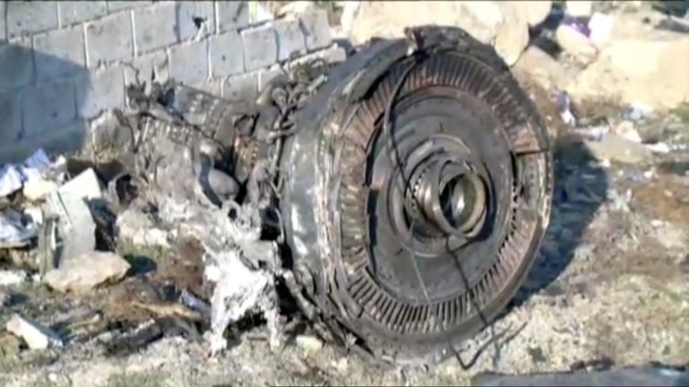 Plane engine among debris