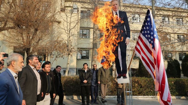 Cardboard cutout of Britain&#39;s ambassador Rob Macaire burned in Tehran