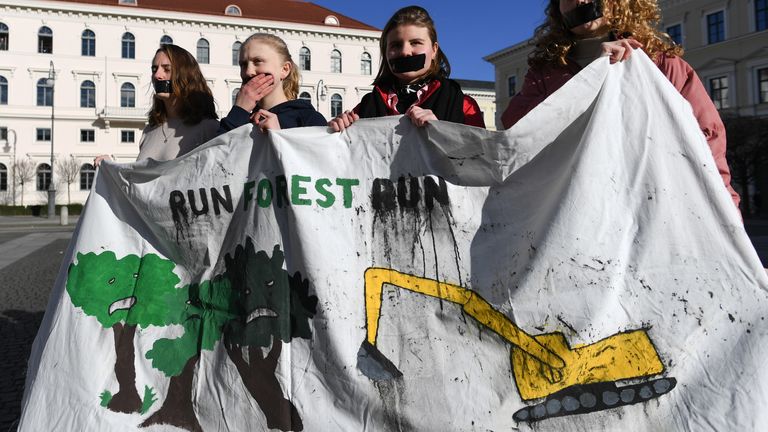Supporters of the Fridays for Future movement protest outside the corporate headquarters of German engineering conglomerate Siemens AG on January 10, 2019 in Munich, Germany. The protesters are demanding that Siemens pull out of its participation in the Adani Carmichael coal mine venture in Australia.