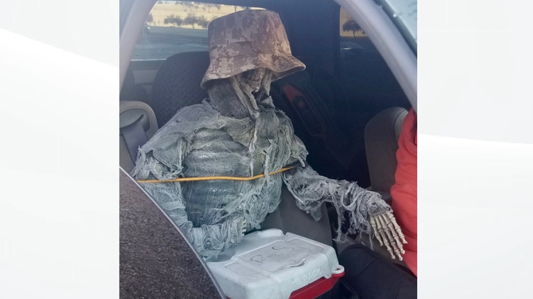 Police stopped a man using a skeleton as a passenger. Pic: Arizona Department of Public Safety