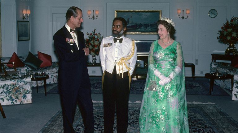 The Queen and Prince Philip entertain Qaboos on board the royal Yacht Britannia in 1979