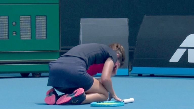Tennis player collapses in a coughing fit at the Oz open.