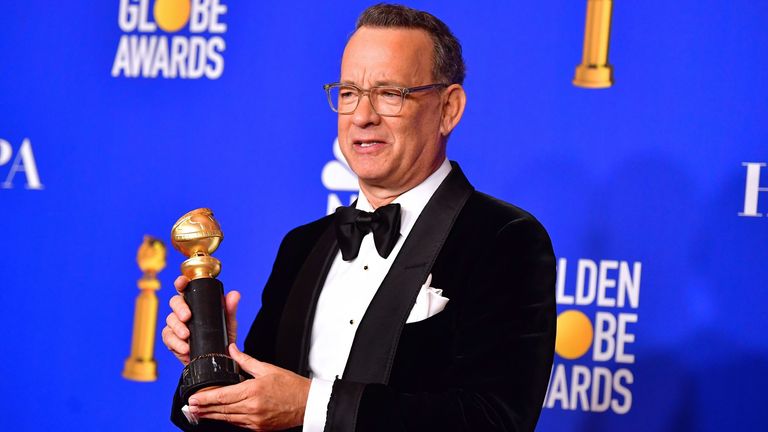 Golden Globes winner Tom Hanks with the Cecil B Demille lifetime achievement award 