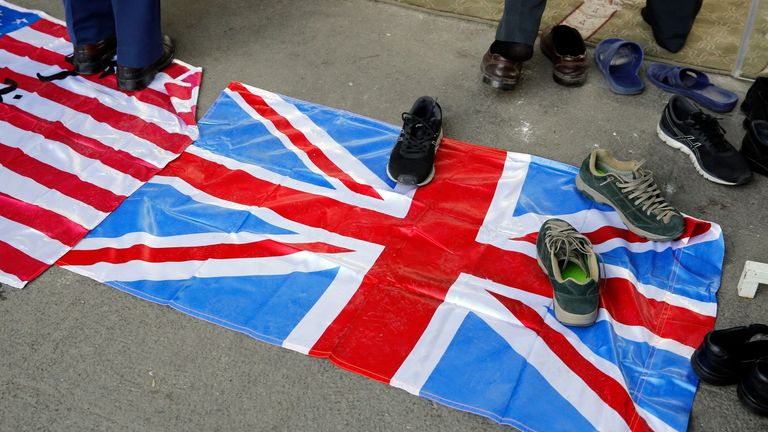 Shoes are placed on a UK flag at a Tehran university Pic: Shutterstock