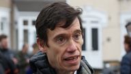 Former Tory MP Rory Stewart speaks to the media at the scene in Seven Kings, Ilford, east London, where three people died after being stabbed Sunday evening